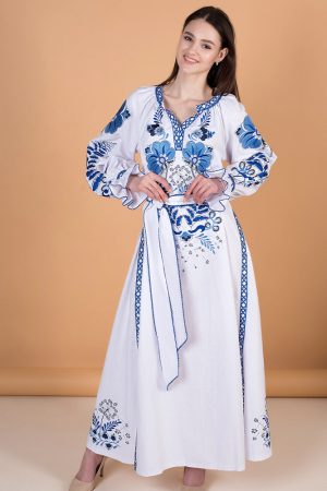 Вишита сукня жіноча «Либідь» лляна біла з синьою вишивкою, довгі рукави, пояс Вишита сукня жіноча «Либідь» лляна біла з синьою вишивкою, довгі рукави, пояс